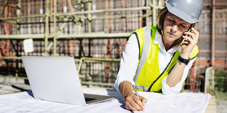 Project team reviewing secure document access controls in a planning meeting